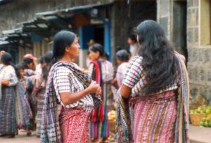 Women in the traditional dress of Santiago Atitlan. Photo by Flickr user tryangulation.